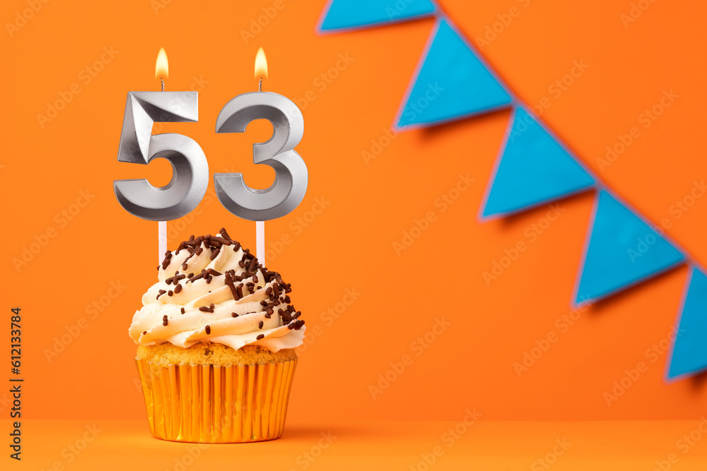 Birthday cake with candle number 53 - Orange background