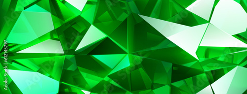 Abstract crystal background in green colors with refracting of light and highlights on the facets