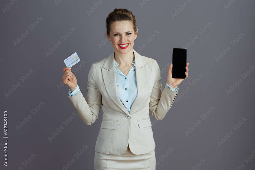 smiling modern female employee in light business suit smiling modern female employee in light business suit