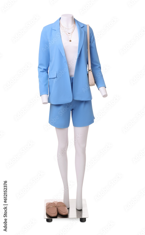 Female mannequin dressed in light blue suit and top with accessories isolated on white. Stylish outfit Female mannequin dressed in light blue suit and top with accessories isolated on white. Stylish outfit
