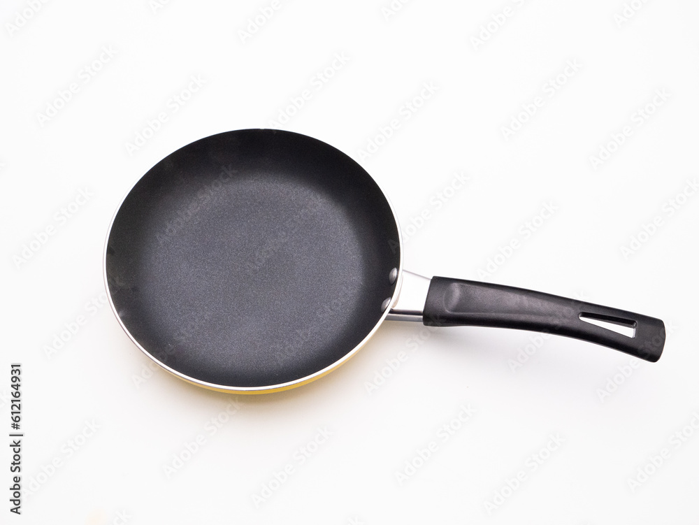 Top view Frying pan isolated on the white floor. Top view Frying pan isolated on the white floor.