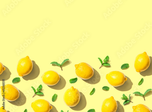 Fresh yellow lemons with mints overhead view - flat lay