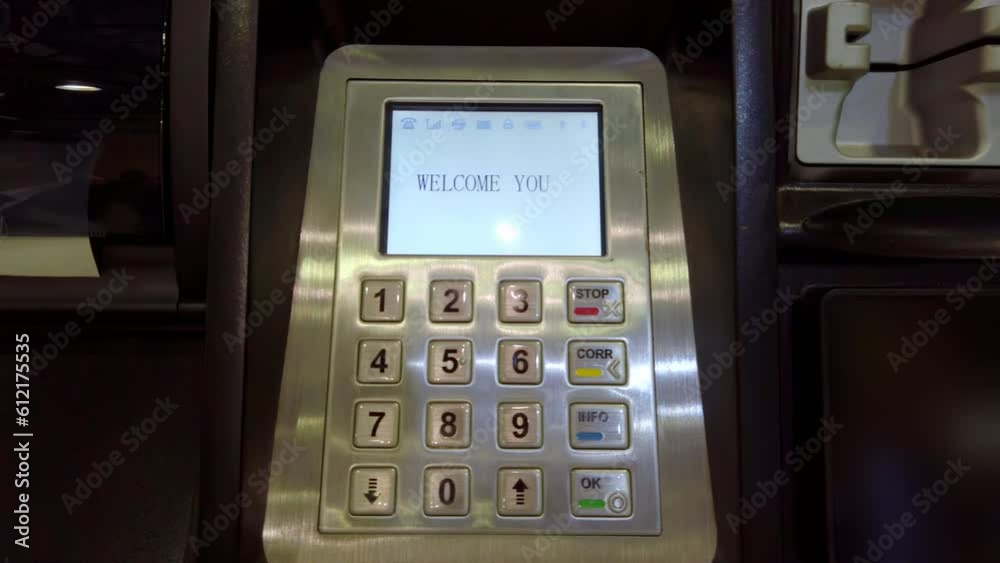 Automated teller machine with keypad and glowing screen Automated teller machine with keypad and glowing screen