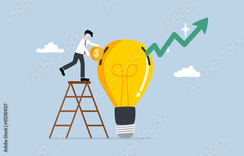 Investment in knowledge for more success, paying for additional learning and skill enhancement concept, Businessman putting coin in light bulb while soaring graph out.