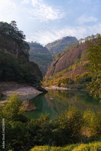 Rock formations lining the nine bend river or Jiuxi in Wuyishan or Mount wuyi scenic area in Wuyi China in fujian province