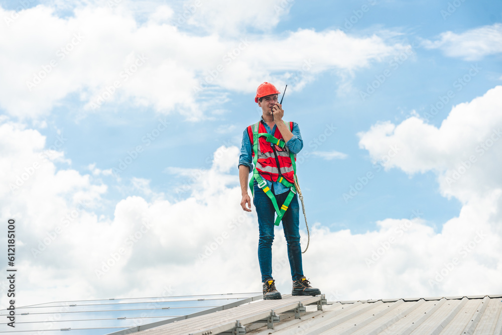 Elegant engineer holding a walkie talkies to working in determined and has a vision like a leader, Discussion and coordination between departments about problem solving, blue collar concept Elegant engineer holding a walkie talkies to working in determined and has a vision like a leader, Discussion and coordination between departments about problem solving, blue collar concept