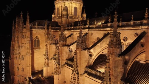 Pinacles of a Gothic cathedral, aerial close up view. Cathedral of Salamanca, Spain, at night. photo