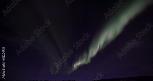 Wallpaper Mural Real-Time V Shaped Northern Lights over a frozen lake in Lapland, Finland Torontodigital.ca