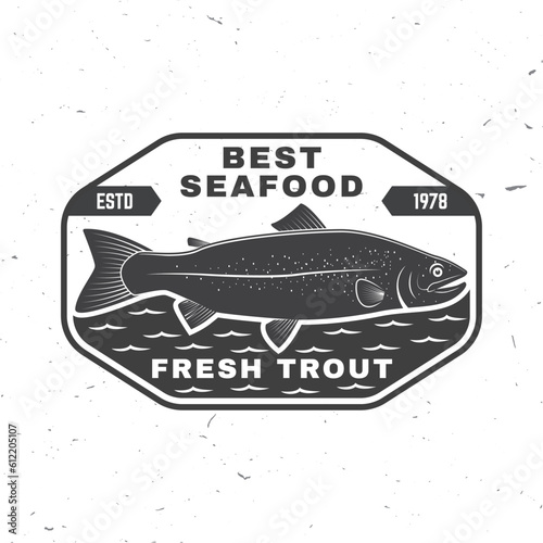Best seafood. Fresh trout. Vector illustration. For seafood emblem, sign, patch, shirt, menu restaurants, fish markets, stores. Vintage monochrome label, sticker with trout Silhouette.
