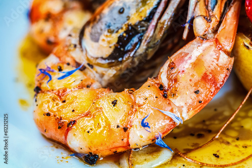 Tablou pe pânză A close-up of a healthy and fresh seafood dish featuring mussels and prawns, perfect for any meal