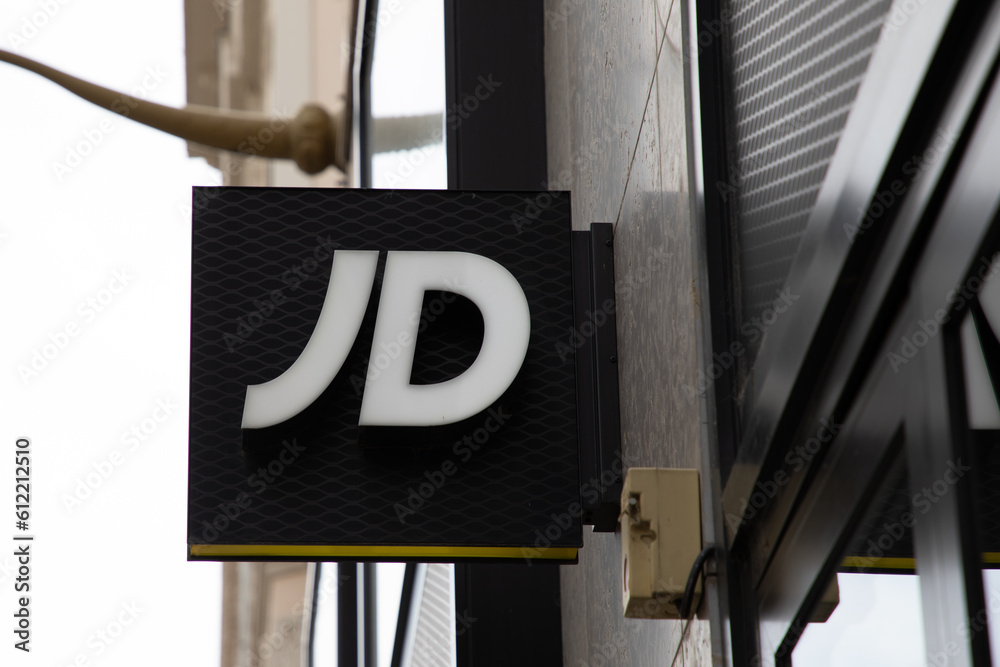 jd sports brand logo and text sign facade wall entrance shop JDSports