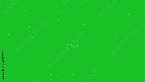 Moving glitter particles on green screen motion graphic effects. 