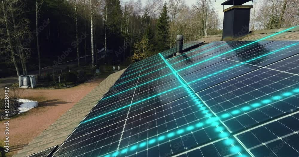 Aerial view over a house collecting sun power with solar cells - Visual effect