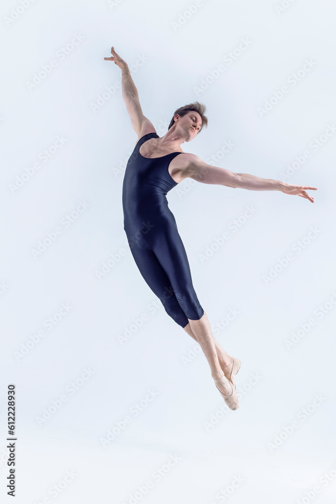 Modern Dance Concepts. Contemporary Art Ballet With Young Handsome Caucasian Dancing Athletic Man in Black Suit In Studio On White