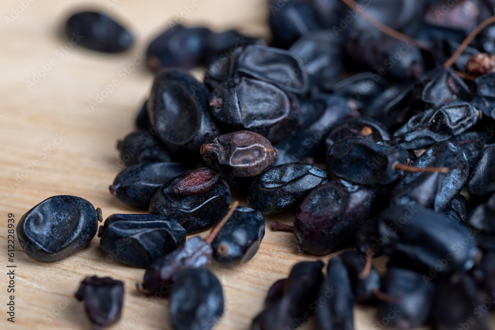 Obraz premium Black spices of dried barberry for cooking meat