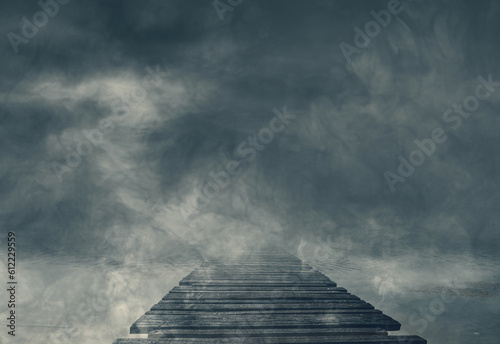 Fototapeta Naklejka Na Ścianę i Meble -  Wooden pier and dark clouds
