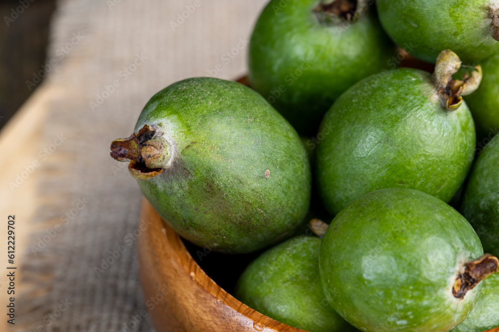 Delicious sweet and sour green feijoa on the table Delicious sweet and sour green feijoa on the table