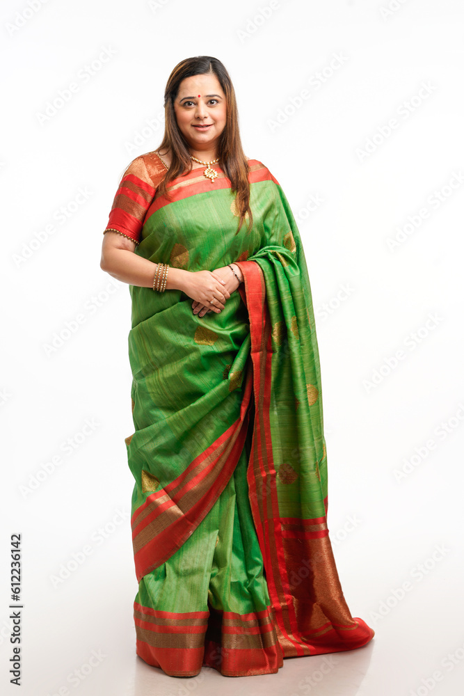 indian woman wearing traditional sari and giving expression. indian woman wearing traditional sari and giving expression.