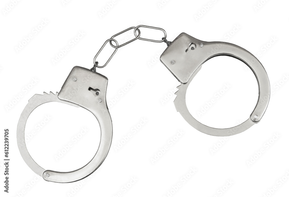 Steel handcuffs isolated on white close up. Steel handcuffs isolated on white close up.