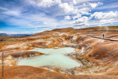 Breathtaking landscape of Acid hot lake with turquoise water in the geothermal valley Leirhnjukur.