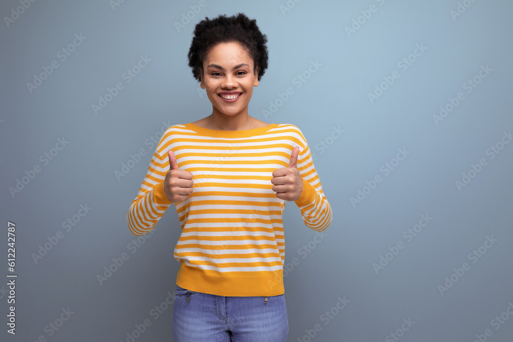 successful happy brunette latin young woman with ponytail smiling on studio background successful happy brunette latin young woman with ponytail smiling on studio background