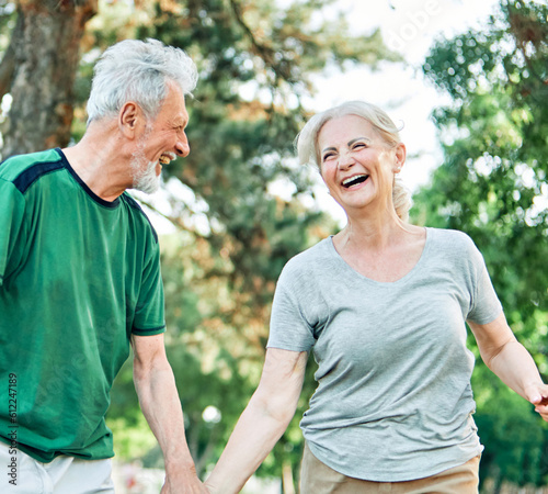 outdoor senior fitness woman man lifestyle active sport exercise healthy fit couple running jogging elderly mature having fun laughing talking together friend hug break