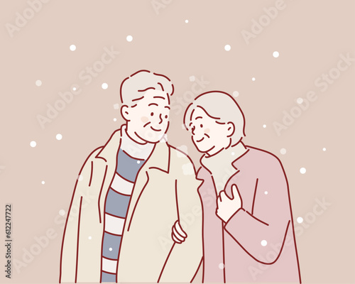Senior couple walking on the city street at winter day. Hand drawn style vector design illustrations.