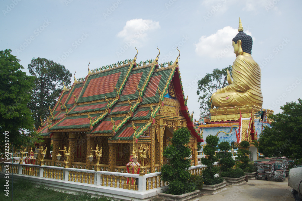 Pra Put Ratanamani Srihathai Naresuan or Luang Por Pan Lan large golden sitting outdoor Buddha and Church in Wat Maniwong. It is a beautiful and faithful Buddha image. Located at Nakhon Nayok,Thailand