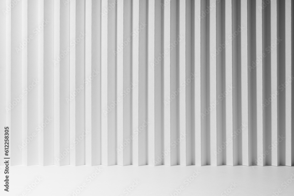 White abstract background of vertical folded striped gradient pattern, perspective, floor as stage mockup for presentation cosmetic products, goods, advertising, design, soft light modern urban style. White abstract background of vertical folded striped gradient pattern, perspective, floor as stage mockup for presentation cosmetic products, goods, advertising, design, soft light modern urban style.