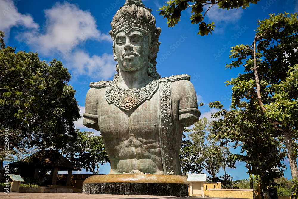 A large copper statue of Wisnu's torso and head at the GWK Cultural Park in Bali, Indonesia