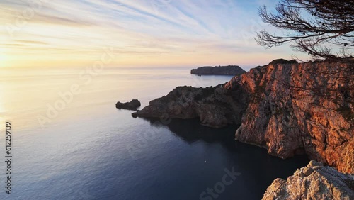 Beautiful morning light at the coastline of Mediterranean Sea (Costa Brava, Parc Natural del Montgrí, les Illes Medes i el Baix Ter) photo