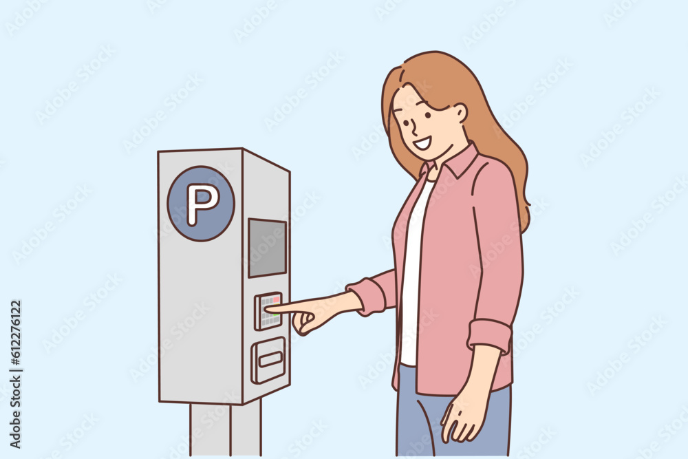 Woman pays for parking for car using street machine to issue ticket or check to avoid getting fine Woman pays for parking for car using street machine to issue ticket or check to avoid getting fine