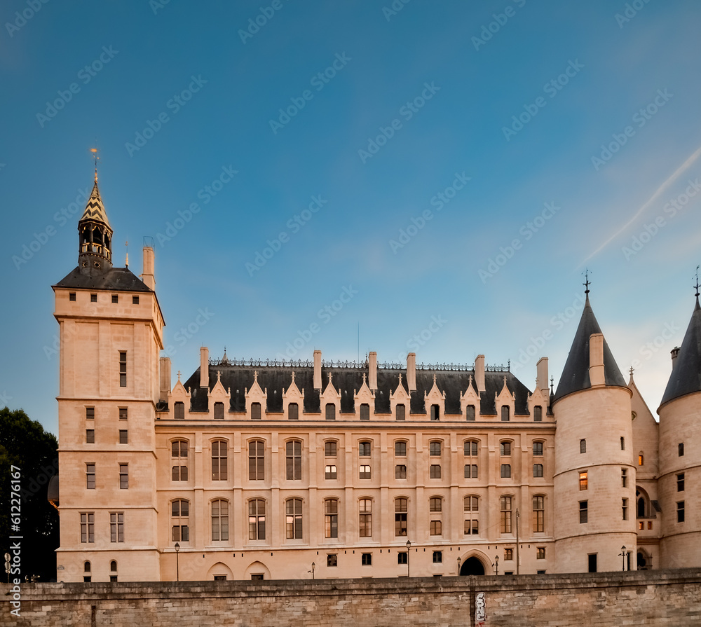 Fototapeta premium Exterior view of an aged gray residential building located in Paris.