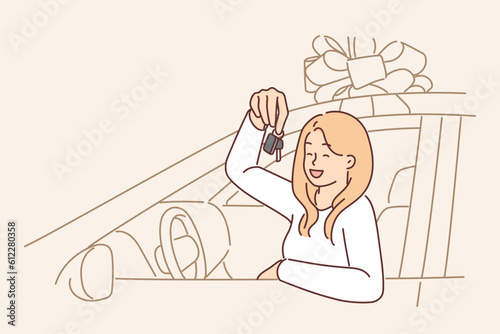 Woman driver with key to donated car sits behind wheel and brags about buying or getting loan