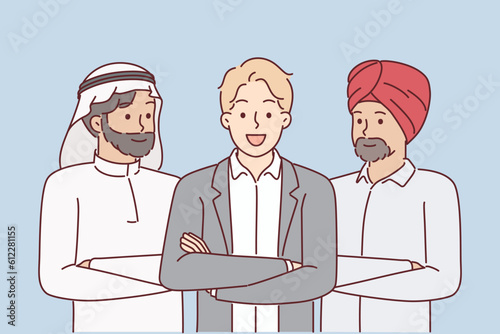 Multinational business team of people from different cultures in national Arabic and Indian clothes