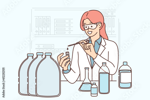 Woman laboratory assistant tests quality of water for presence of microbes and harmful impurities