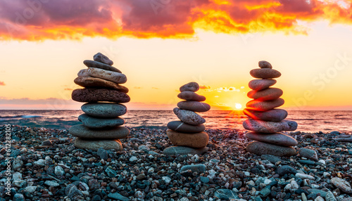 Photography three towewrs or turrets of stone in a nice empty sea beach with coast line guri