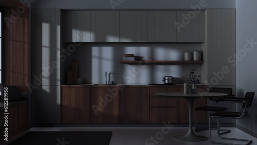 Japandi trendy wooden kitchen and dining room. Wooden cabinets  table and marble top. Minimalist interior design. Dark late evening scene