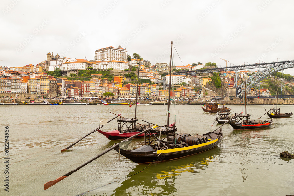 Boats on the Douro River overlooking the city of Porto in Portugal.