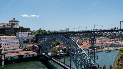 Panoramic view of the Luis I bridge on the Douro river in the city of Porto, Portugal.