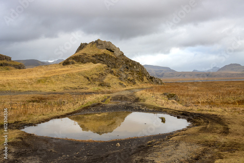 Hill reflected in a lake, Iceland © yassmin