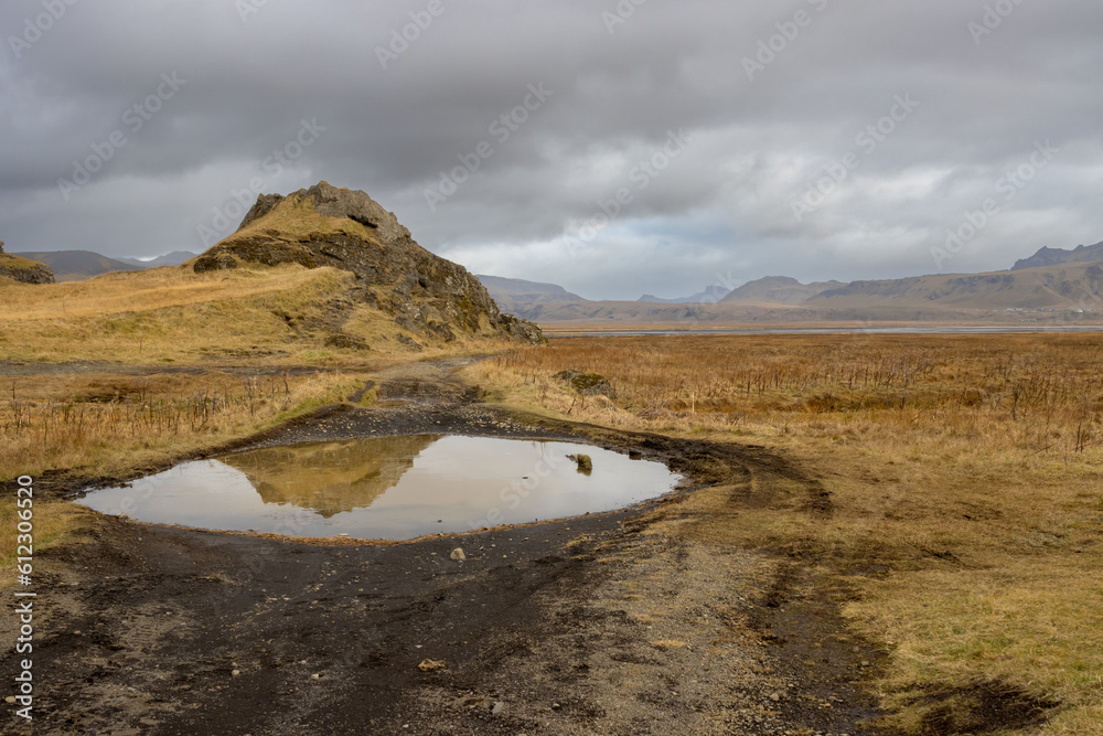 Hill reflected in a lake, Iceland