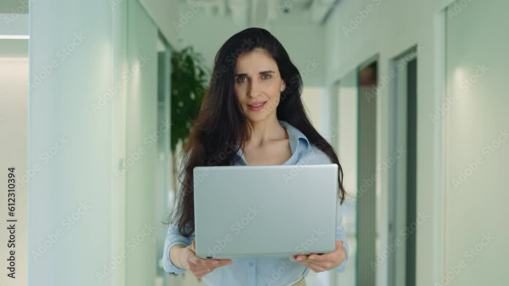 Woman It Worker Holding Laptop, Smiling Looking at Camera. Woman It Worker Holding Laptop, Smiling Looking at Camera.