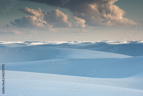 Clouds over tranquil white sdunes, White Sands, New Mexico, United States