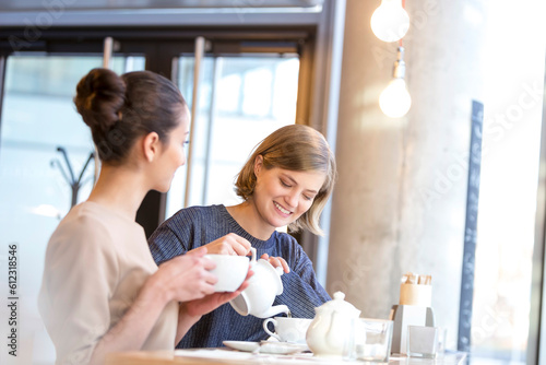 Women drinking tea in cafe