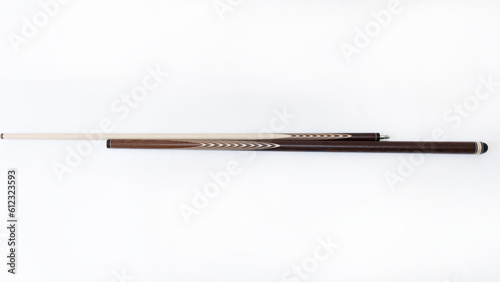 Φωτογραφία Billiard cues on a white background