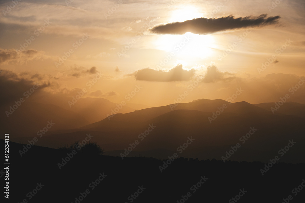 Sunset landscape with scenic mountains view Sunset landscape with scenic mountains view