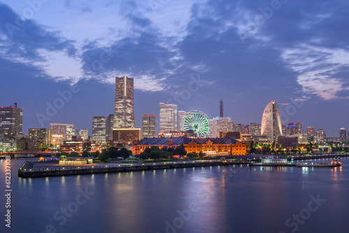 Yokohama  Japan city skyline from the bay at twilight.