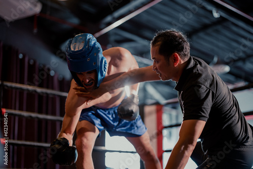 The referee's role in a boxing match is to enforce rules during each round, advice fighters before the competition begins. Determining when a boxer's health is at risk. Signaling when a round is over