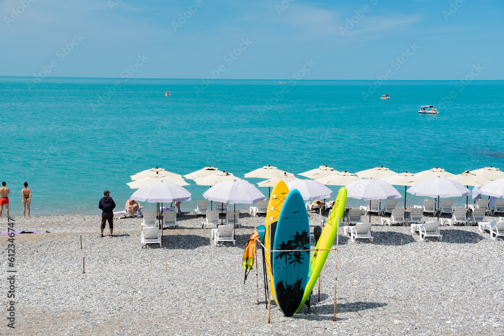 Abkhazia Gagra 06.06.2023 The city beach with sun loungers and umbrellas is ready to receive vacationers Abkhazia Gagra 06.06.2023 The city beach with sun loungers and umbrellas is ready to receive vacationers
